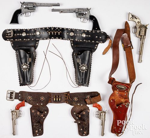 GROUP OF TOY CAP GUNS WITH HOLSTERS