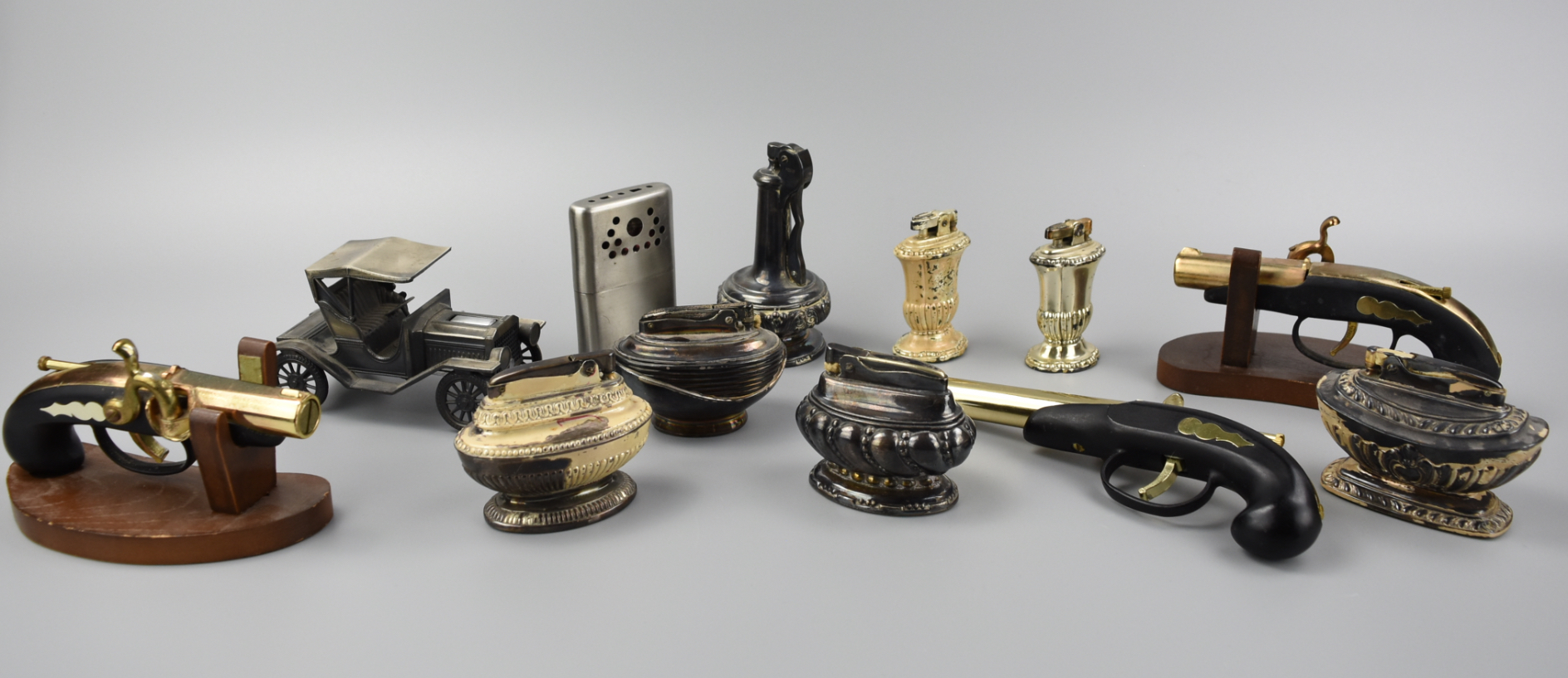 (GROUP OF TWELVE LIGHTERS OF