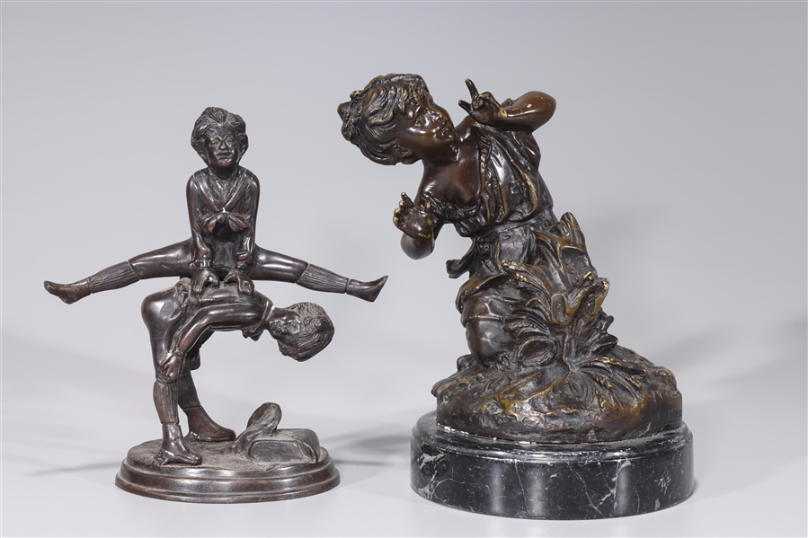 Group of two bronze statues