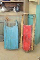 GROUP OF TWO PAINTED SLEDS. On