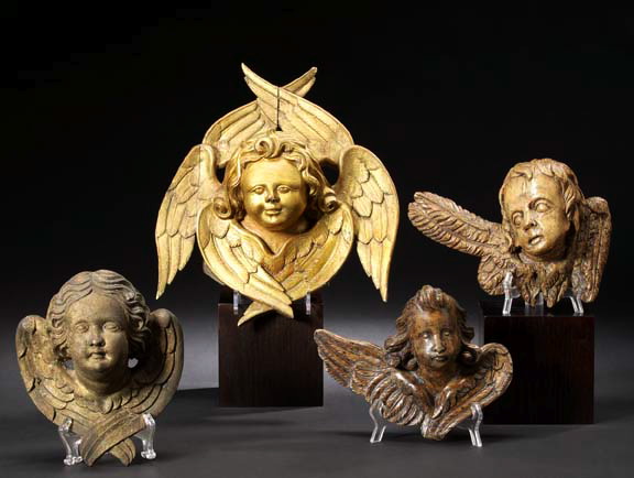 Group of Two Putto Heads,  one a