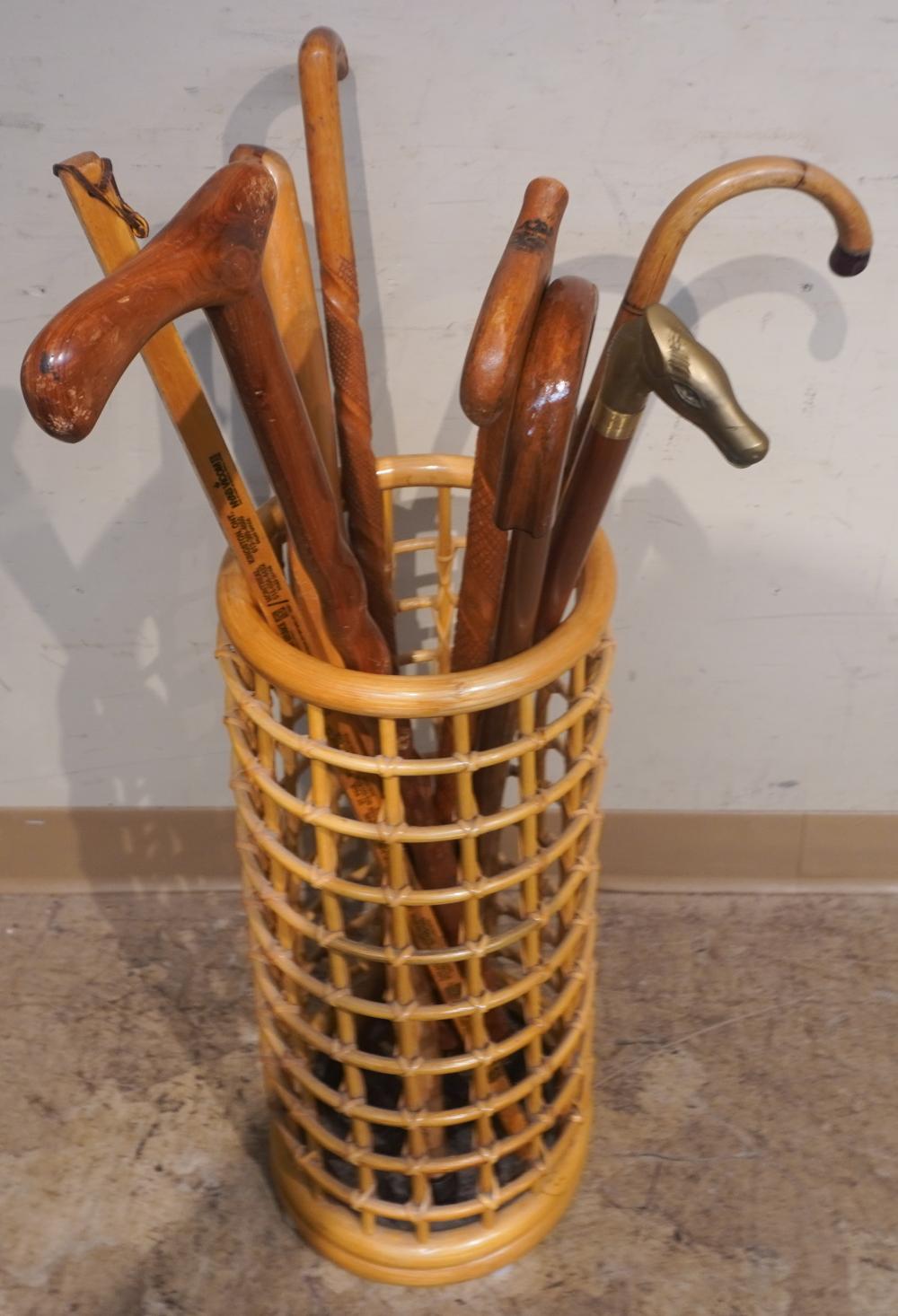 GROUP OF WOOD CANES WITH UMBRELLA