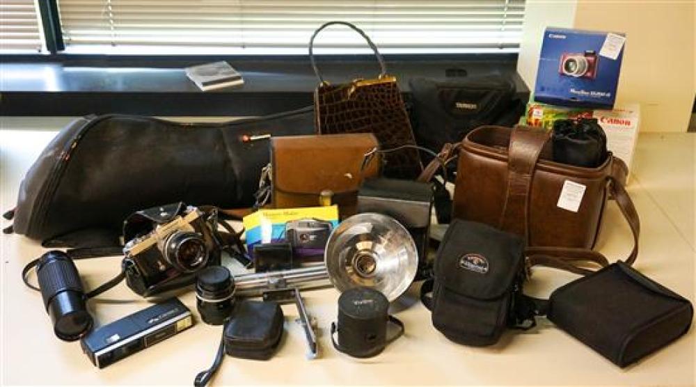 GROUP WITH BINOCULARS, CAMERAS,