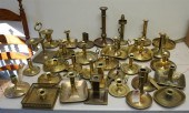 GROUP WITH BRASS CHAMBERSTICKS