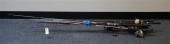 GROUP WITH FISHING RODS AND RE