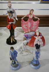 GROUP WITH SEVEN PORCELAIN FIG