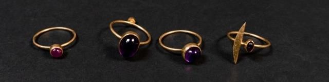 GROUPING OF 4 18KT GOLD RINGSLot
