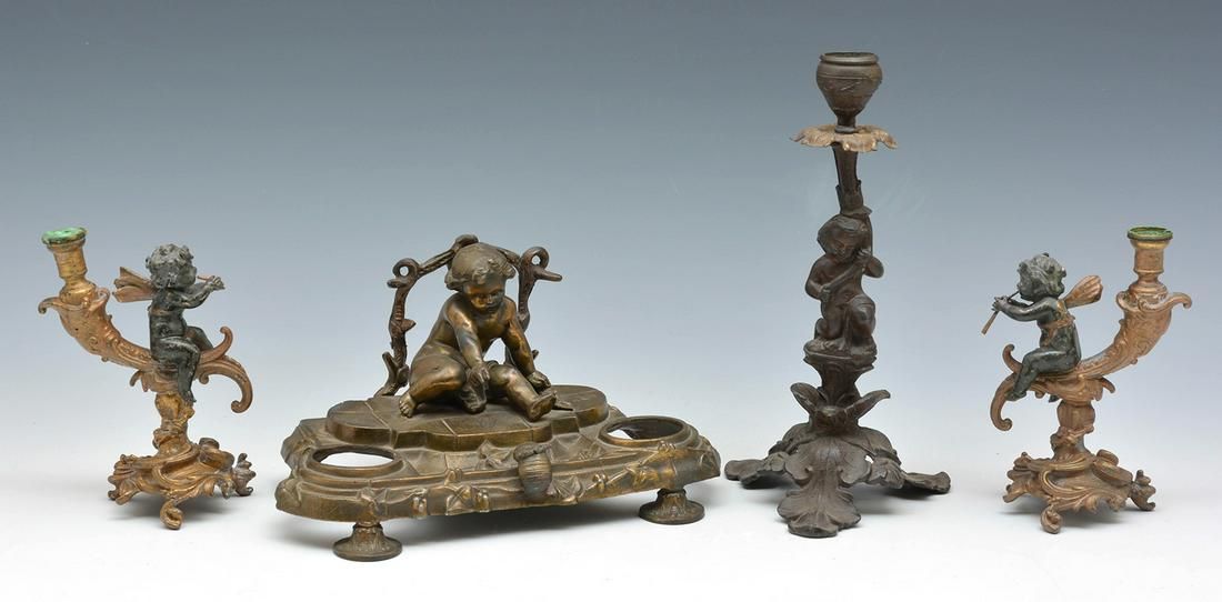 GROUPING OF 4 METAL PUTTI