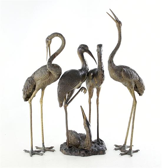 Grouping of bronze garden herons