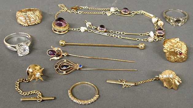 Grouping of gold jewelry to