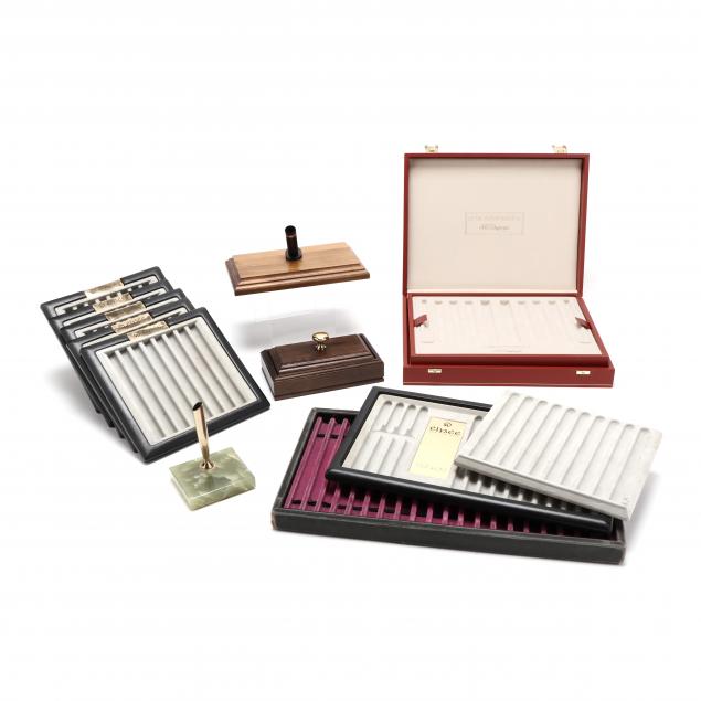 GROUPING OF PEN TRAYS AND