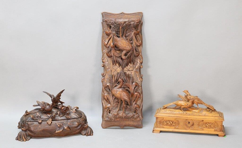 GROUPING OF THREE CARVED BLACK