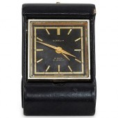 GUBELIN GOLD PLATED AND LEATHE