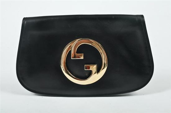 GUCCI BLACK LEATHER CLUTCH. The