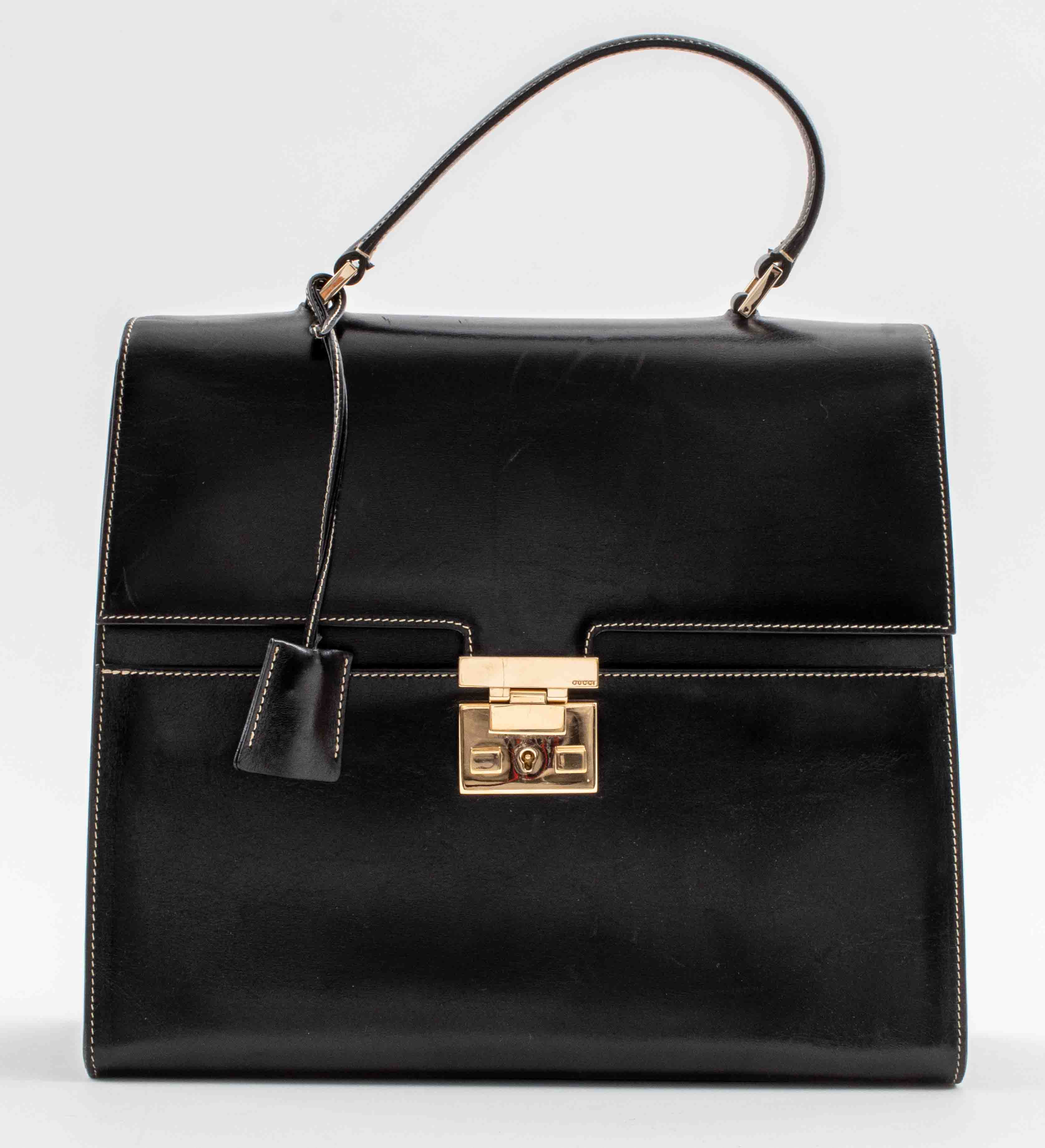 GUCCI BLACK LEATHER PURSE Gucci
