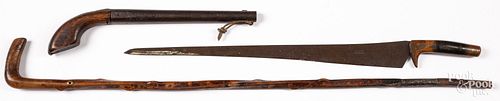 GUN BARREL, CANE, AND SHORT