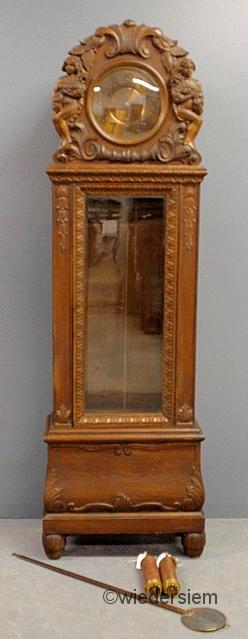 Gustav Becker oak tall case clock