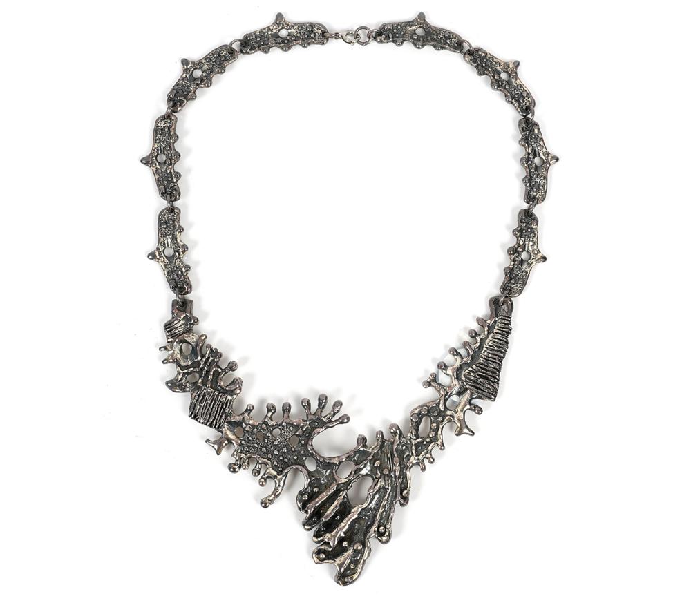 GUY VIDAL BIOMORPHIC PEWTER BIB