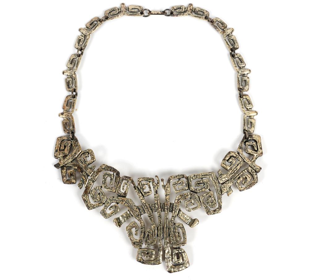 GUY VIDAL SQUARED CURLICUE BIB