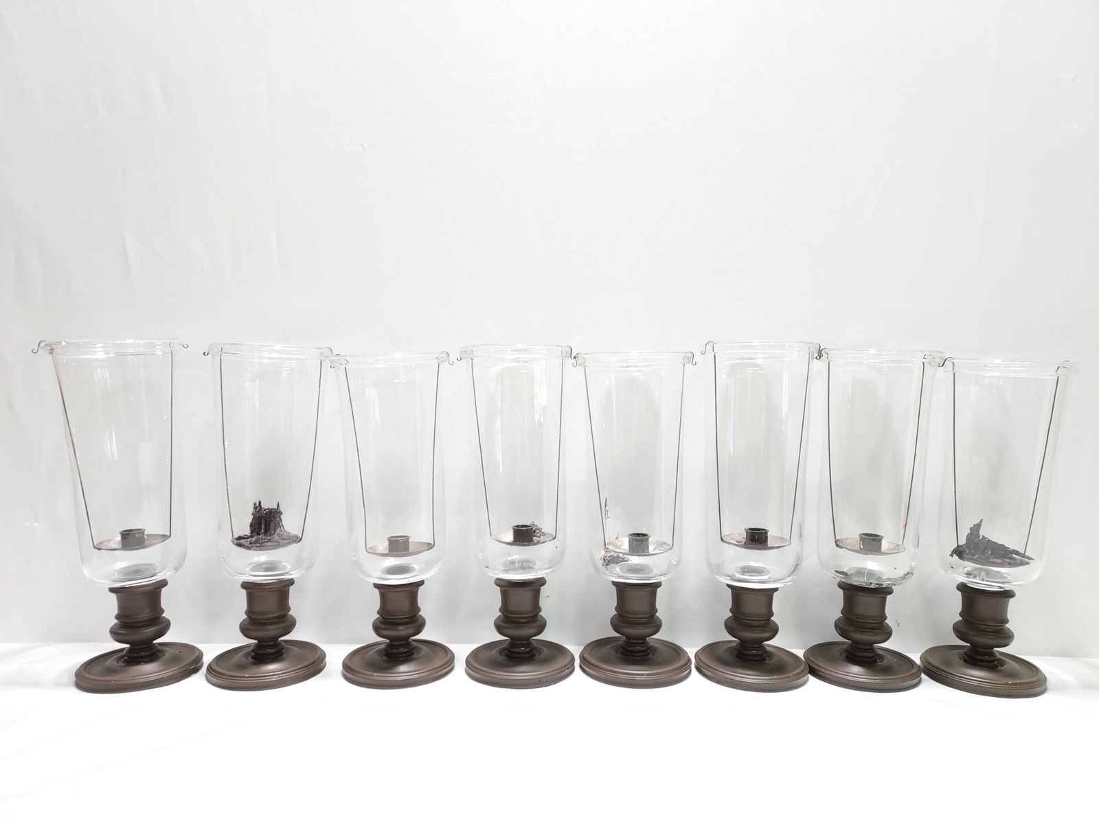 H5 8 CANDLESTICKS WITH TALL