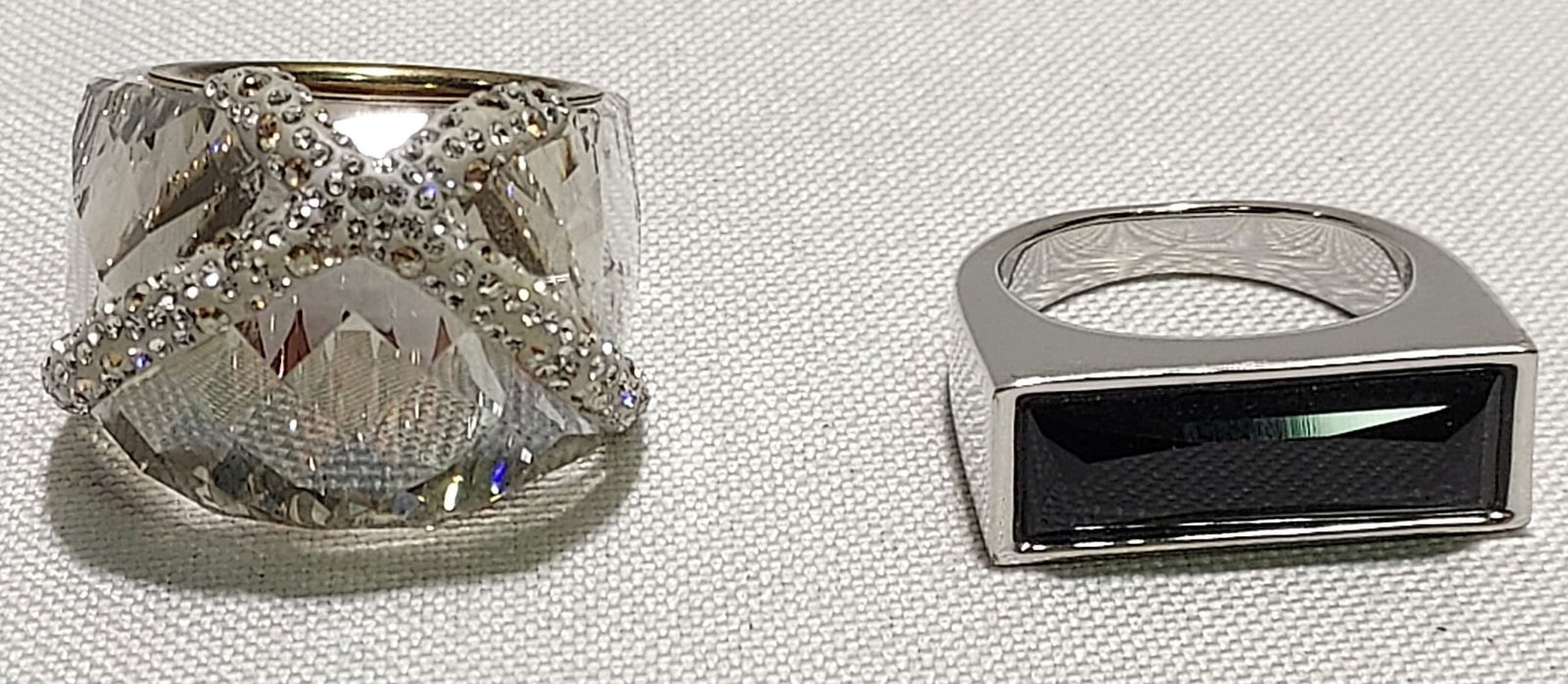 H581 TWO SWAROVSKI RINGS.Two