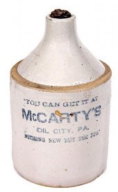 HALF GALLON ADVERTISING JUG "M