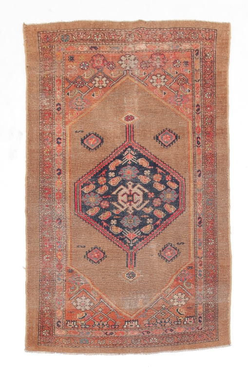 HAMADAN RUG. Ca. 1920. Camel ground