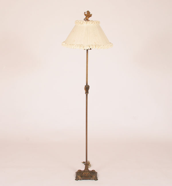 Hammered and gilt metal floor lamp,