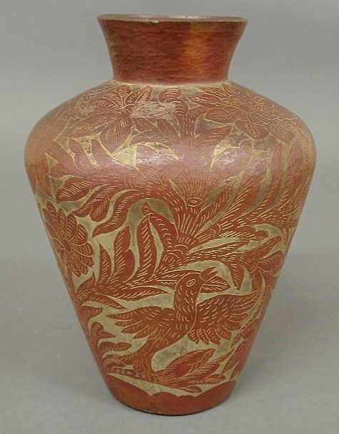 Hammered copper vase with incised