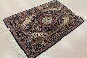 HAND KNOTTED ORIENTAL AREA RUG
