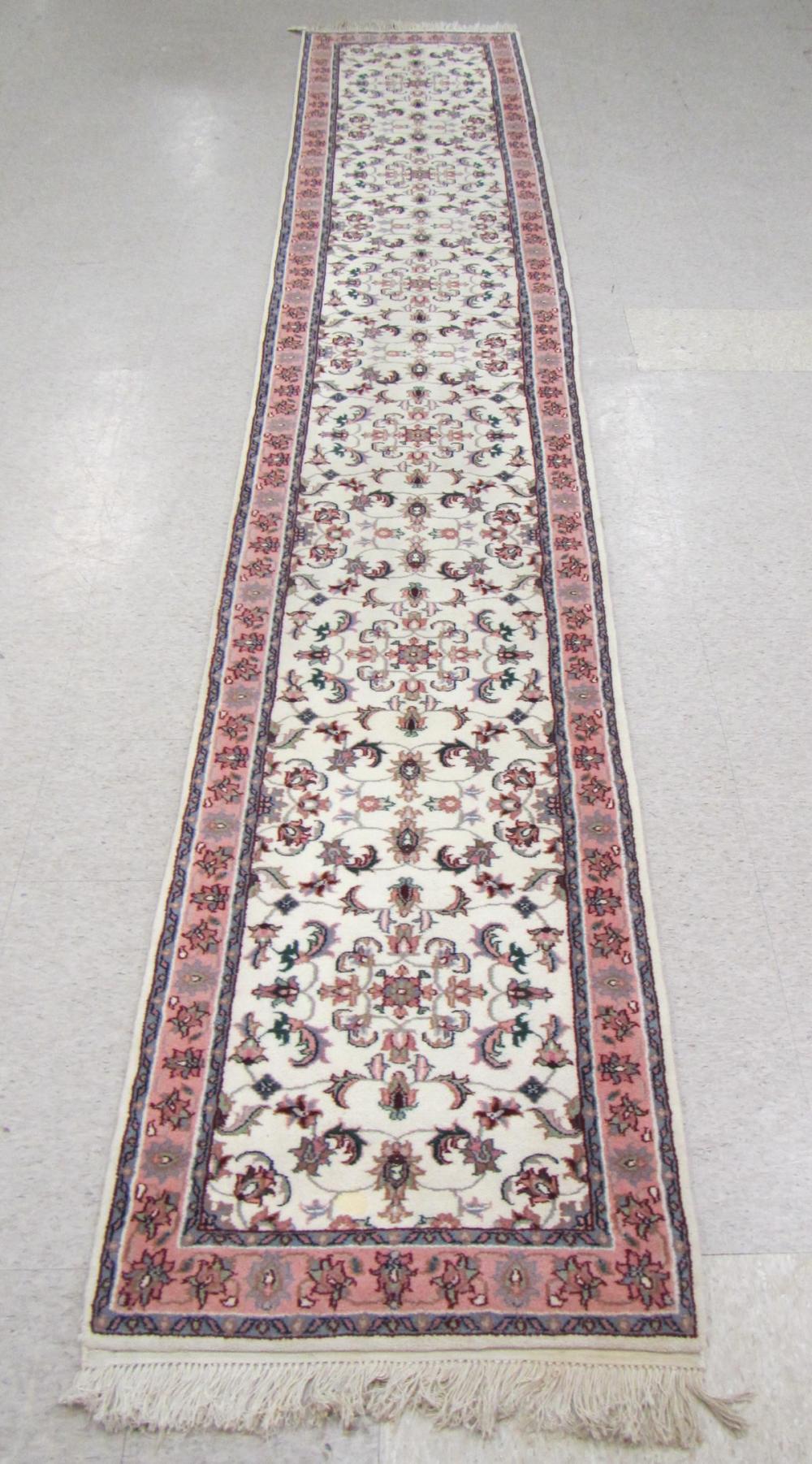 HAND KNOTTED ORIENTAL RUNNER,