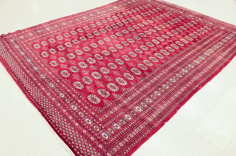 HAND KNOTTED RED BOKHARA CARPET,
