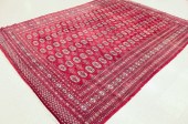 HAND KNOTTED RED BOKHARA CARPE