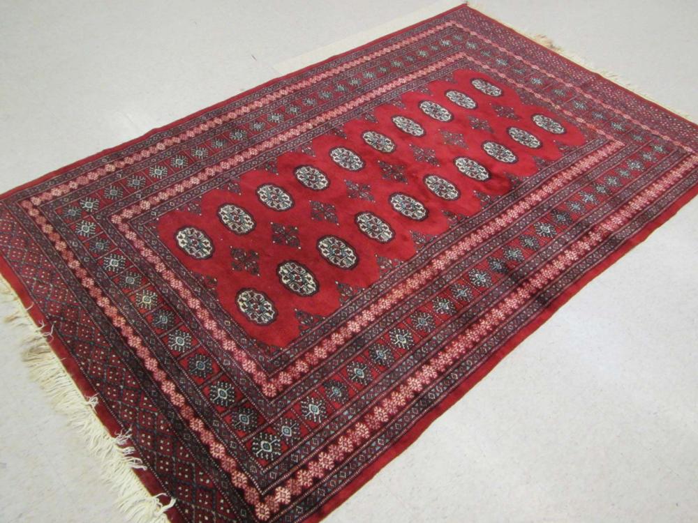 HAND KNOTTED RED BOKHARA CARPET,