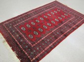 HAND KNOTTED RED BOKHARA CARPE