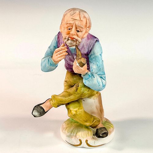 HAND-PAINTED PORCELAIN FIGURINE,