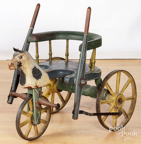 HAND-PROPELLED CARVED AND PAINTED
