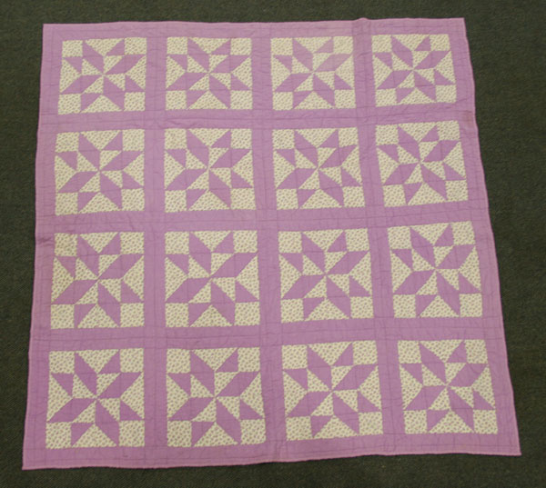 Hand sewn quilt; cotton pieced