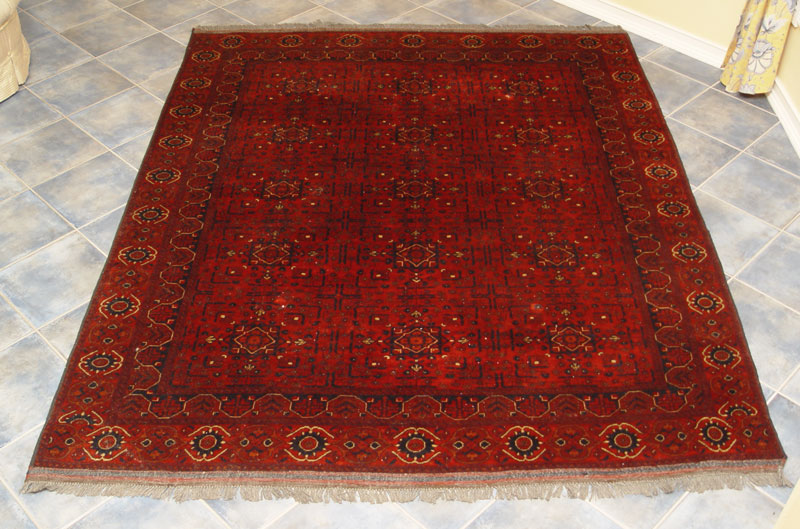 HAND TIED BOKHARA RUG: Rich red and