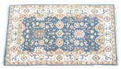 HAND-TIED INDO-OUSHAK RUG, 8'1