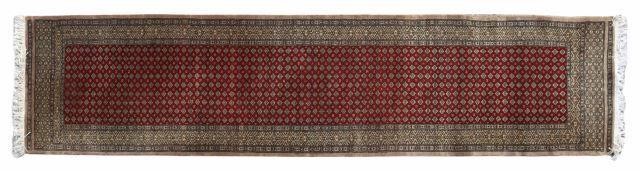 HAND-TIED PAKISTANI BOKHARA RUNNER,