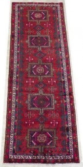 HAND-TIED PERSIAN HERIZ RUG, A