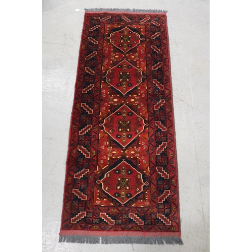 Handwoven red ground hall runner,