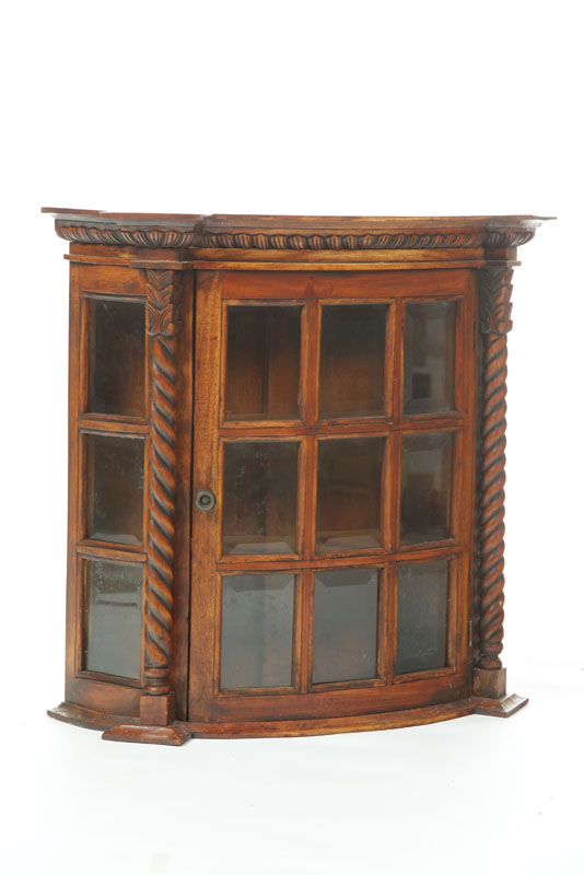 HANGING CUPBOARD. Walnut  bow front