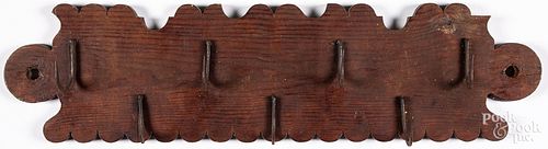 HANGING PINE AND IRON GAME RACK,