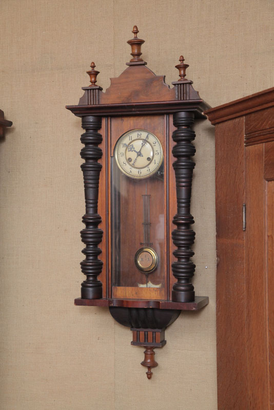 HANGING WALL CLOCK. Unattributed.