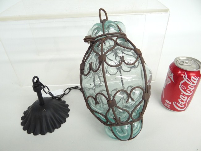 Hanging wire and bubble glass lamp.