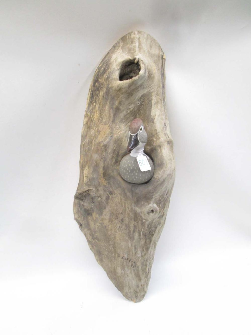 HANGING WOOD CARVING OF A WOOD DUCK