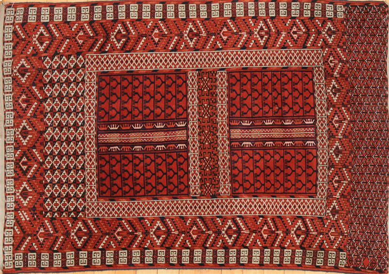 HATCHLI WINE RED-GROUND RUG AND TWO