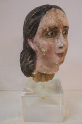 HEAD OF CARVED WOODEN SANTOS D